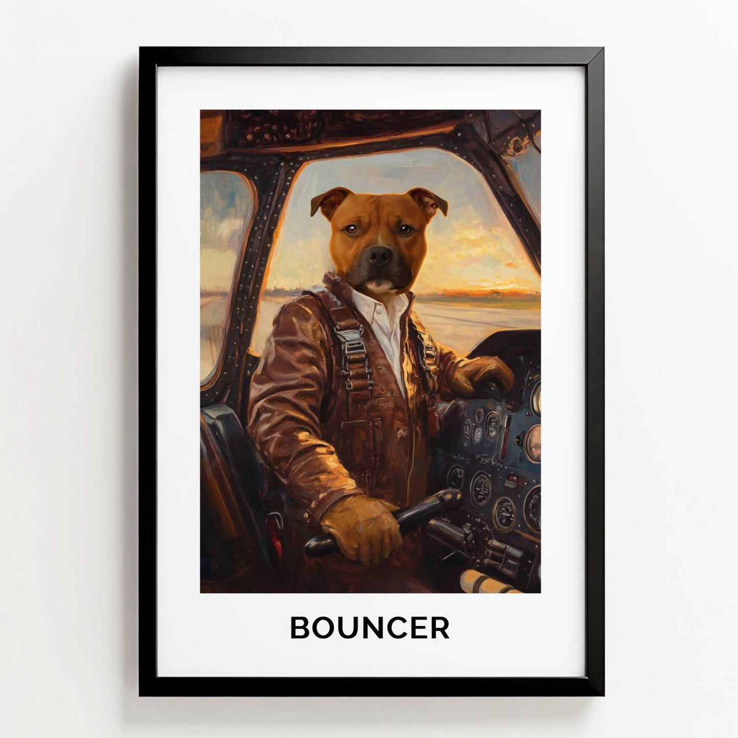 Ingelijste pilotenposter van hond Bouncer in cockpit bij zonsondergang, met naam onder het portret